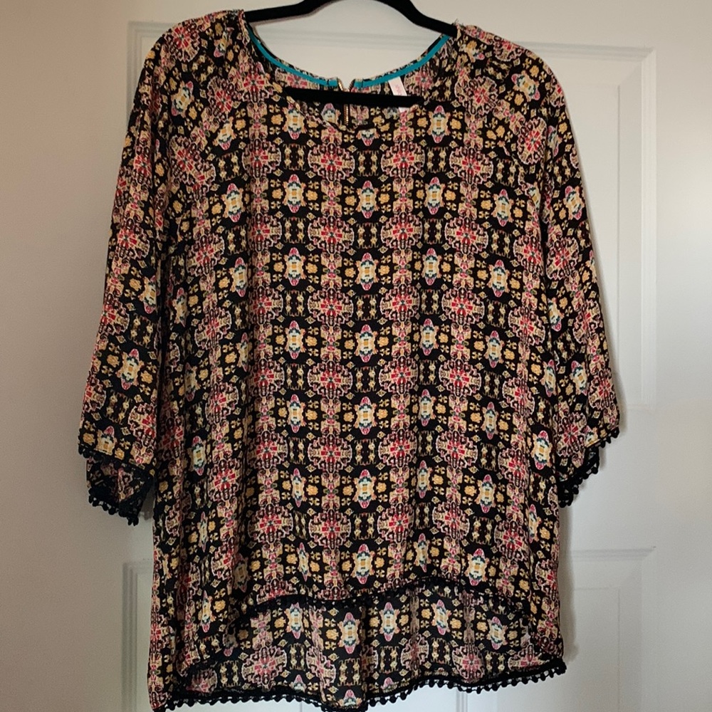 XL xhilaration top! 100 % polyester, high low cut at bottom! Black ball trim!